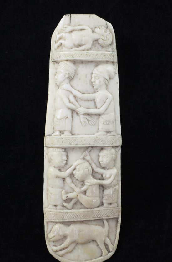 A 19th century west African ivory plaque, 8in.